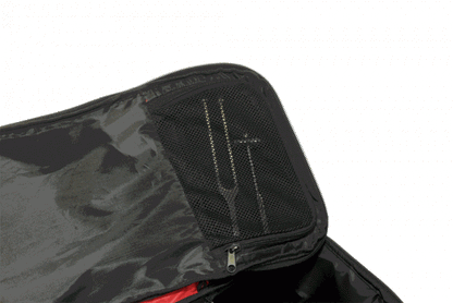 Black emergency medical bag with mesh zippered pocket holding tools