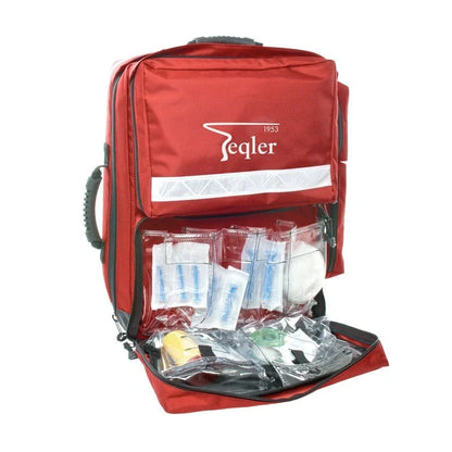 Red emergency medical backpack open to show organized first aid supplies inside